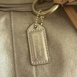 Coach gold med size handbag
